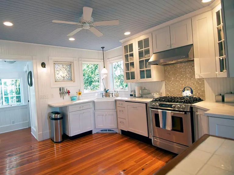 Newly renovated kitchen features Bosch SS stove and Bosch dishwasher and retains the original cottage charm.