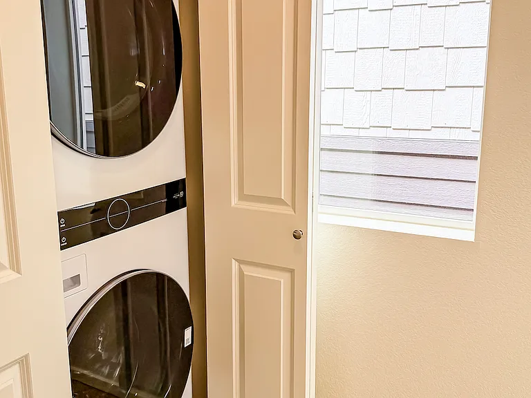 Convenient full-size washer & dryer included.