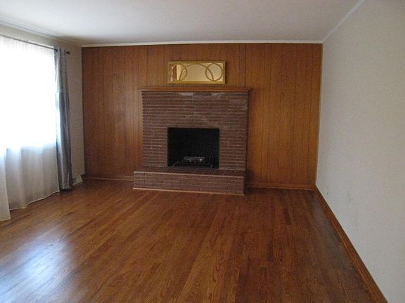family room with wood burning fireplace