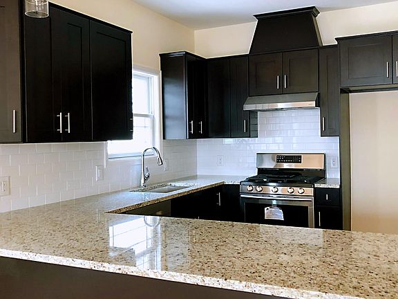 Modern eat-in kitchen with granite countertop