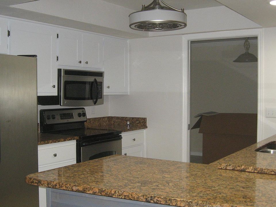 Large, open kitchen area with counter seating