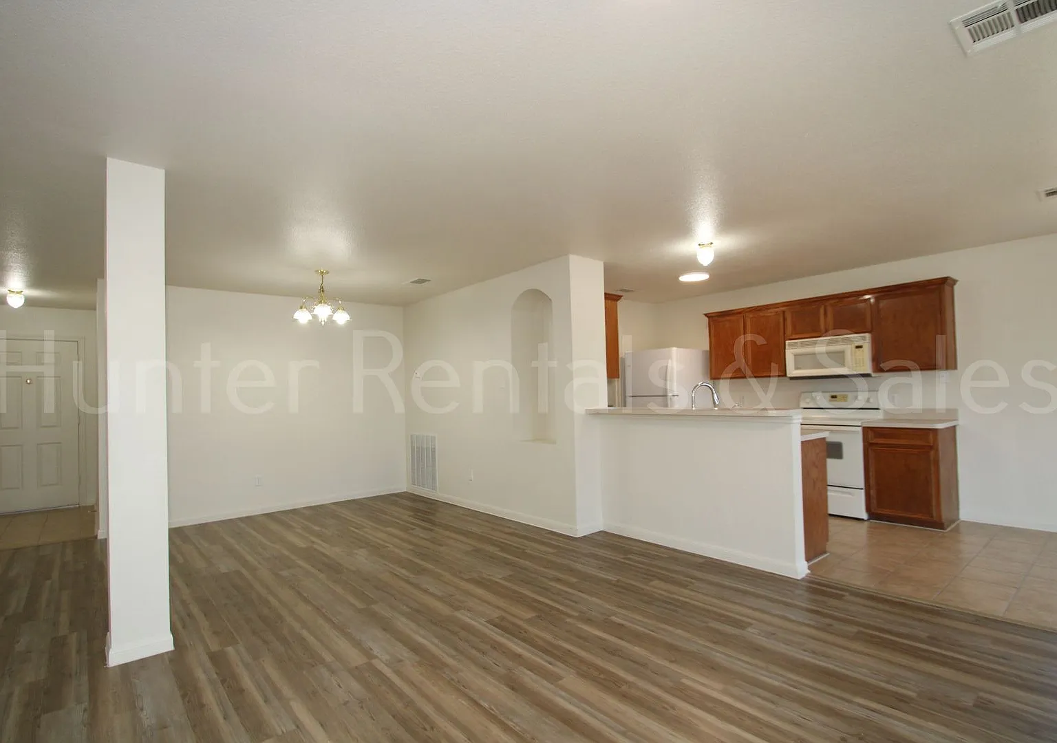 Charming 3-Bedroom Home with Fireplace, Spacious Primary Suite & Covered Deck — Photo 4