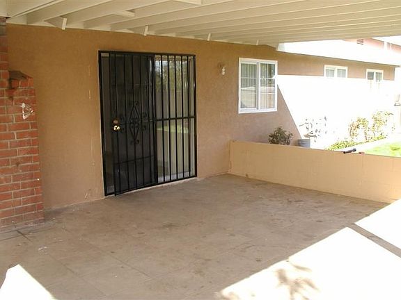 Covered Patio With Travertine Tile