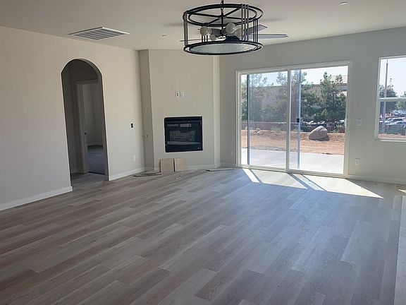 Dining Room & Living Room (doorway to the left leads to Master Bedroom)