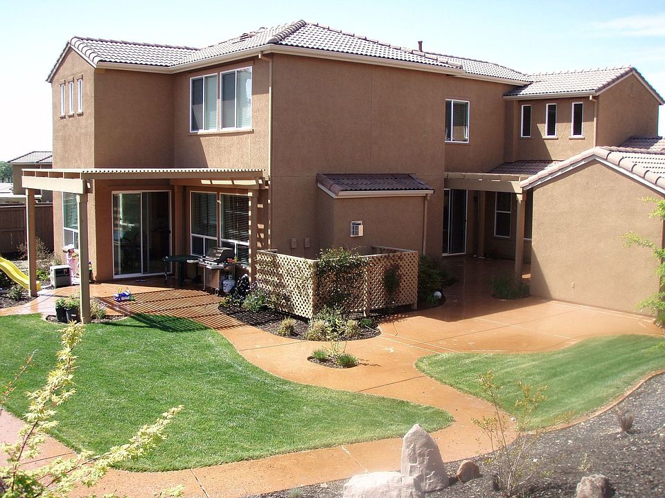 spacious backyard with private courtyard