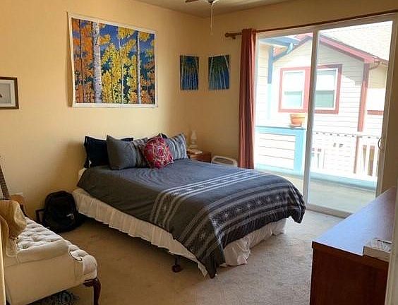 Primary Bedroom with balcony access