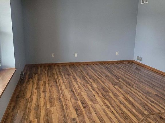 From front door: Family room with box window looking out to the front of the house