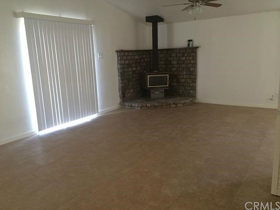 living room with free standing wood stove