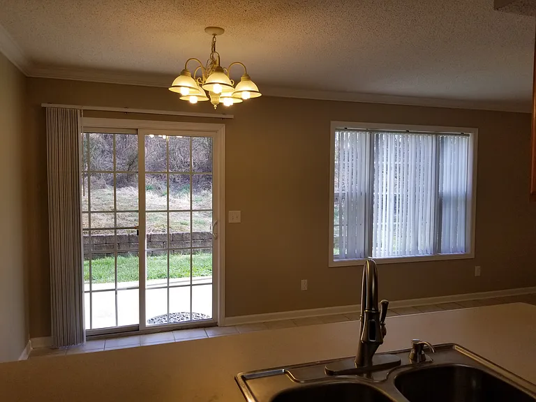 VIEW OF DINING AREA AND BACK PATIO
