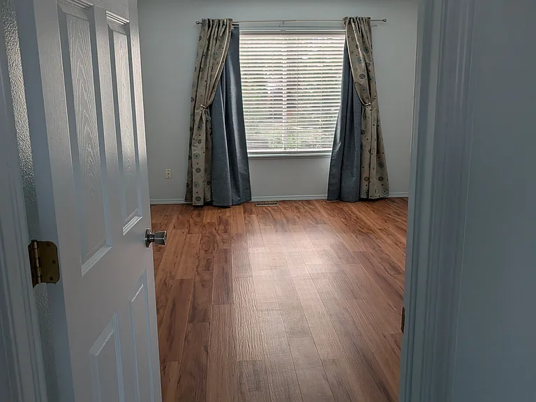 master suite, with view of the backyard