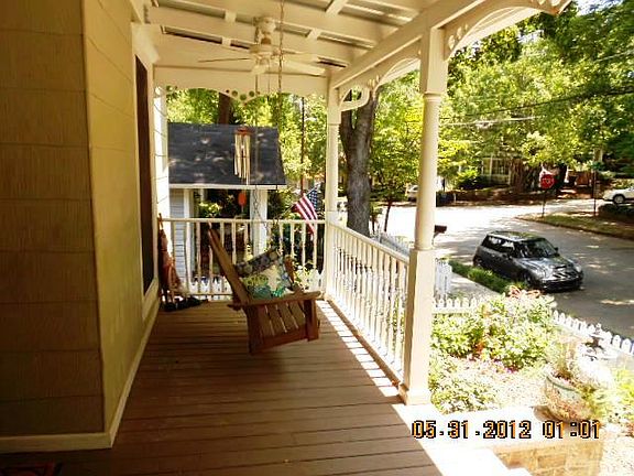Rocking chair front porch overlooking quiet Inman Park street, walk to Inman Park Village