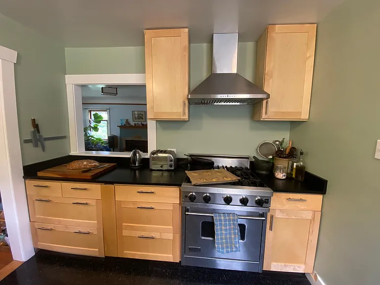 Newly remodeled kitchen with Viking stove and soft close cabinets