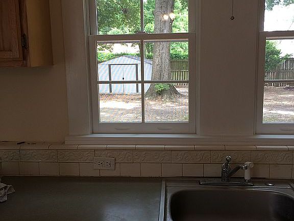 kitchen overlooks large yard