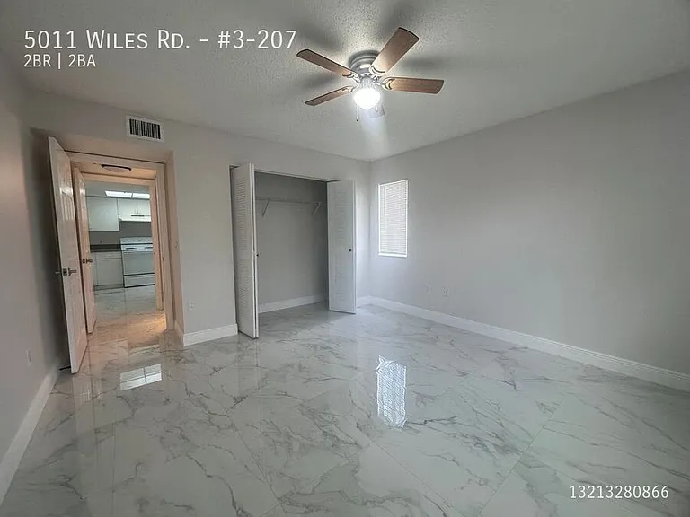 5011 Wiles Rd #3-207 — Photo 18