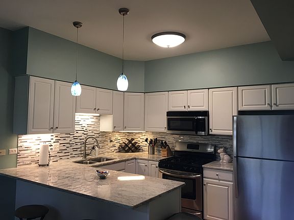 Fridge has been replaced with water and ice dispenser.