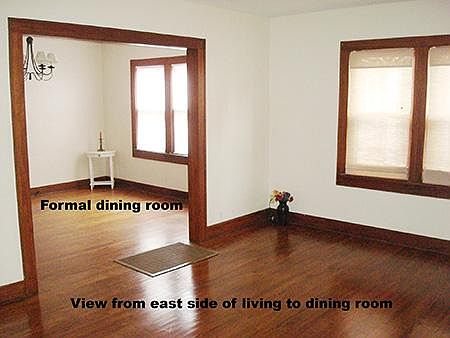 Living room and adjacent dining room.