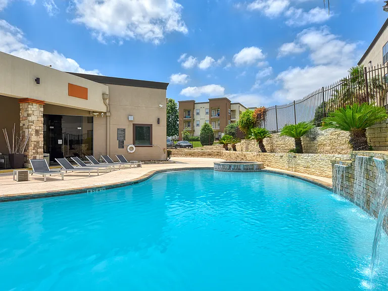 Resort Style Swimming Pool with waterfall