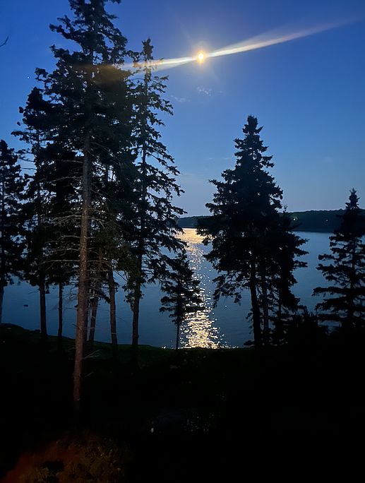 View from the upstairs balcony of the moon over Goose Cove