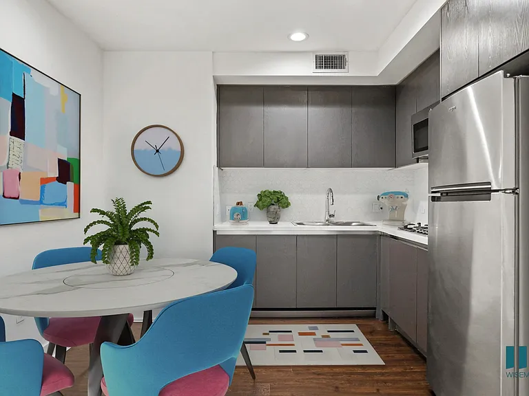 Kitchen with Stainless-Steel Appliances and Dining Area