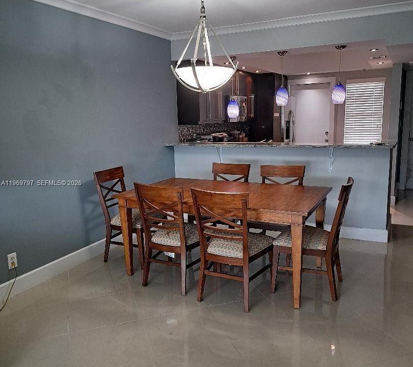 2nd image of 3150 N Palm Aire Dr APT 905