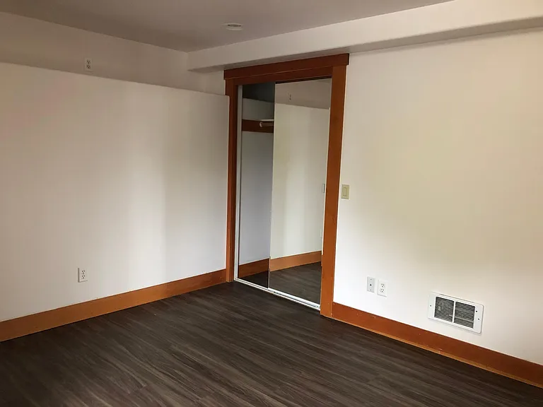 Other side of bedroom looking toward closet