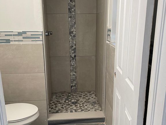 Bathroom walk in shower soon to have glass door installed.