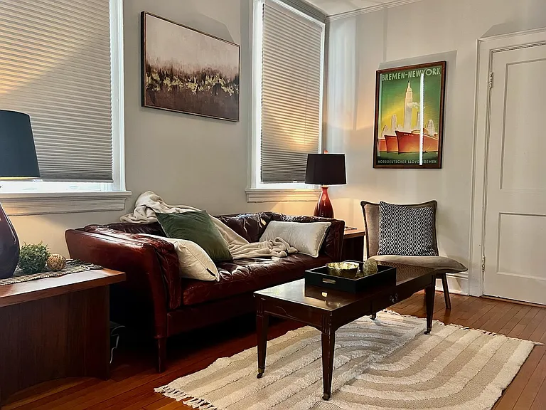 Stylish and comfortable living room with large winows.