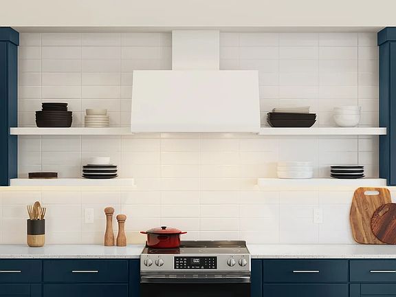 Kitchen with white floating shelves and subway tile backsplash