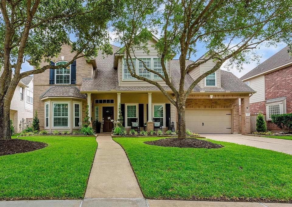 This 4/3.5/3 home exudes curb appeal from its brick elevation, charming details and its professionally landscaped lawn.