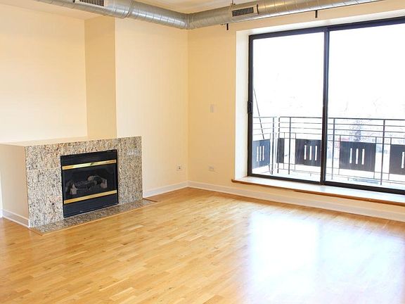 Living room opens out to a huge balcony.