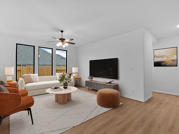 Gathering room. Sample product photo. Actual exterior and interior selections may vary by homesite.