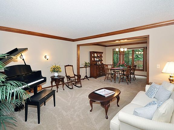 Spacious living room opens to formal dining room
