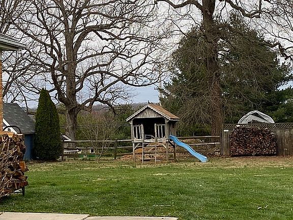 Slide, sandbox, playhouse