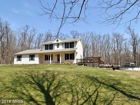 Front of Home with Decks and Pool