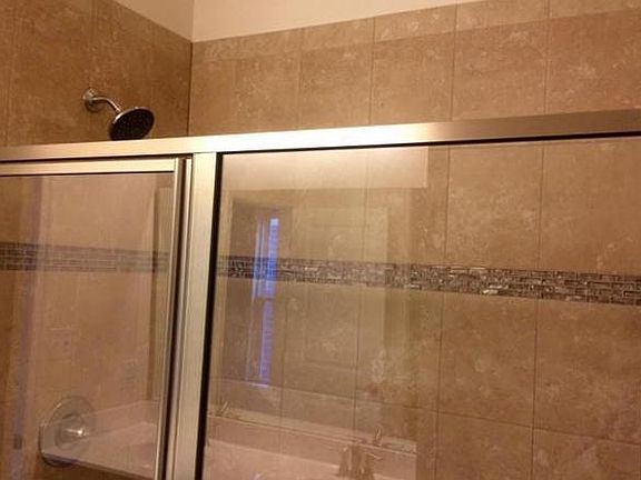 Main Bathroom with dual showerheads and sinks