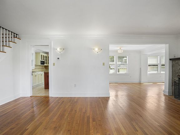 Living Room to Kitchen on Left and Dining Room on Right