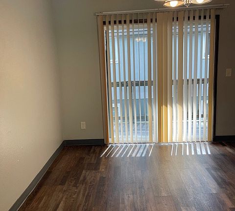 Dining area with slider to balcony