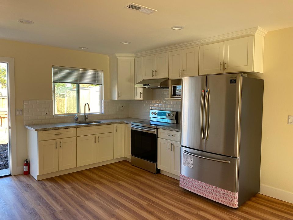 Open concept kitchen with all new flooring, cabinets, appliances etc.