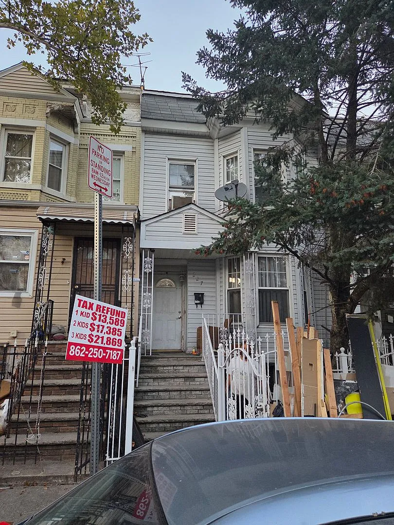 5BR/1.5BA Row Home with Backyard and Laundry Hookups — Photo 1