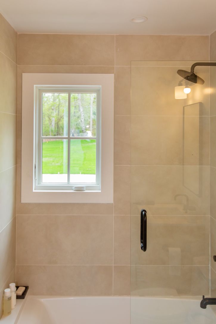  Guest bathroom with bath and shower