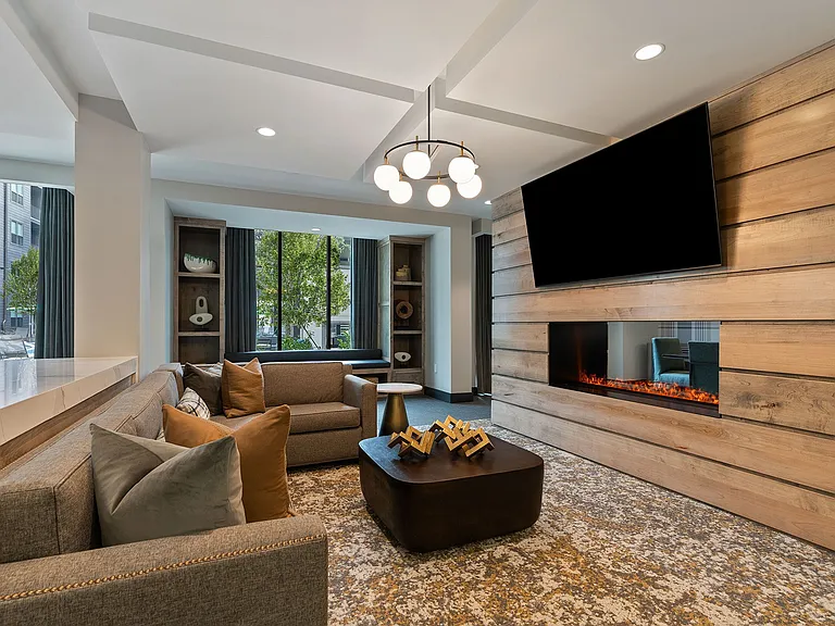 Enjoy our inviting clubroom, complete with comfortable couches, a cozy fireplace and large-screen TVs