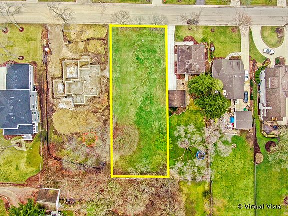 Rare 80' wide/frontage by 190' deep lot in NW Downers Grove blocks from two Metra train stations, pa