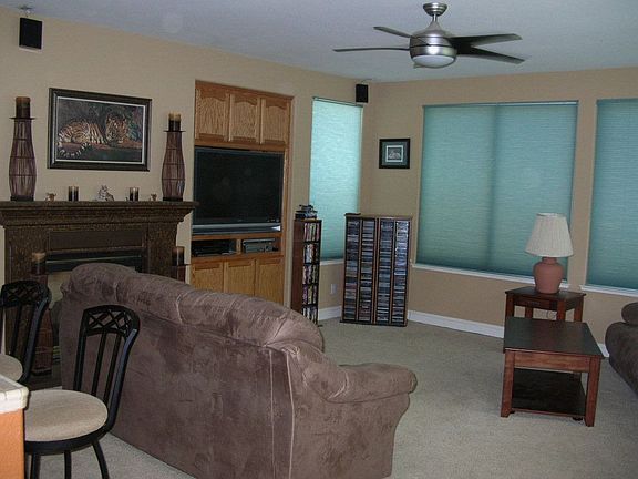 Downstairs Family Room with Fireplace & Built In Media Niche