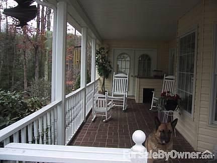 Covered Back Porch
						:
						Overlooks patio area, backyard, woods and pasture.