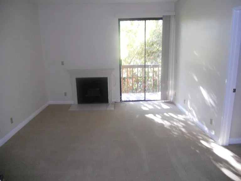Fireplace in master bedroom with private balancy