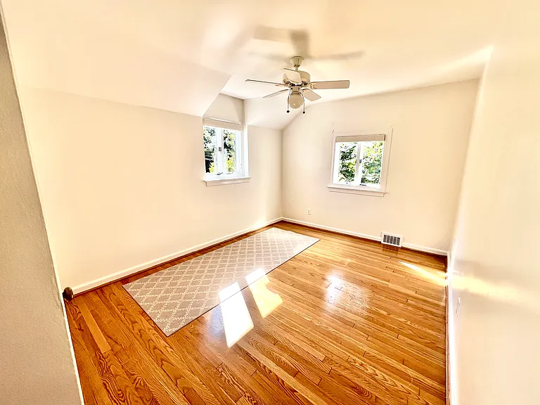 Bedroom #3, with one closet and ceiling access to the attic.