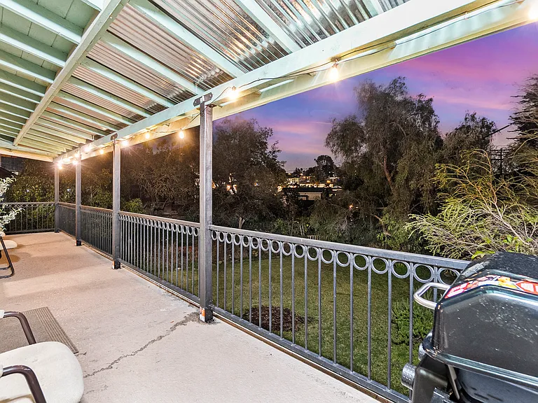 This balcony with cozy chairs is perfect for relaxing and enjoying view.