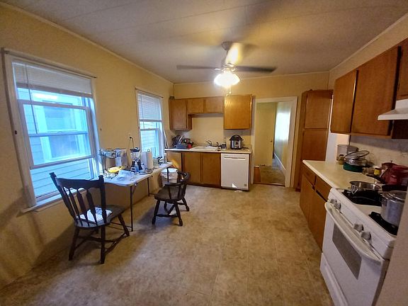 Kitchen with gas stove, dishwasher, disposal
