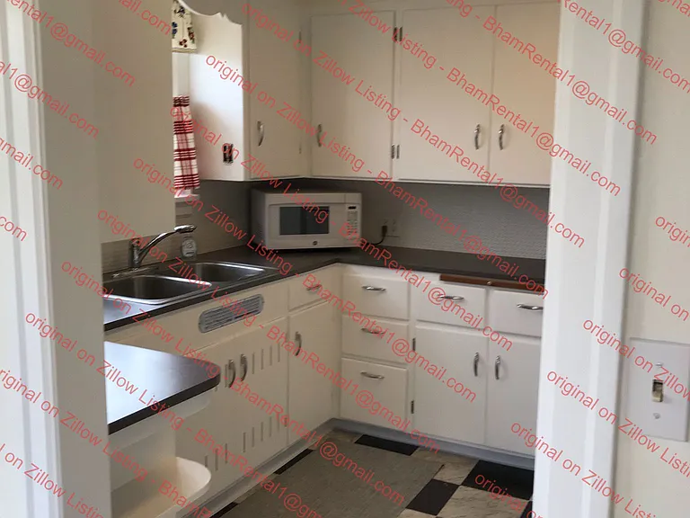 Kitchen; updated flooring, countertops, tile backsplash in retro style.