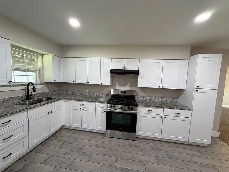 7825 Dugan St — Photo 6